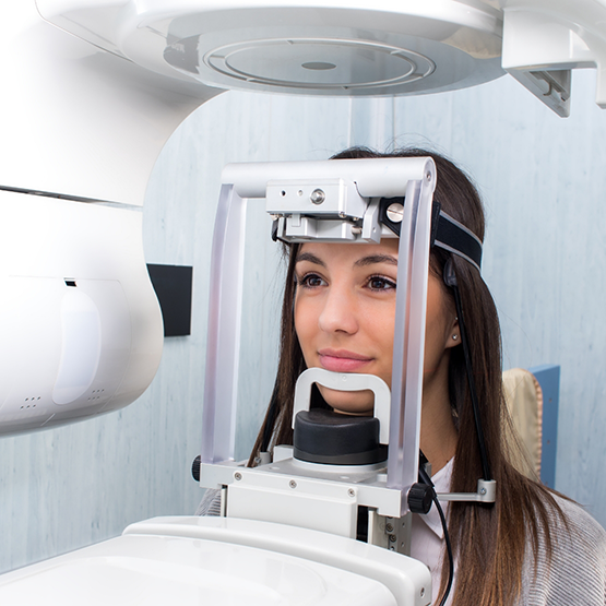 Dental patient having a C T scan of her jaw taken