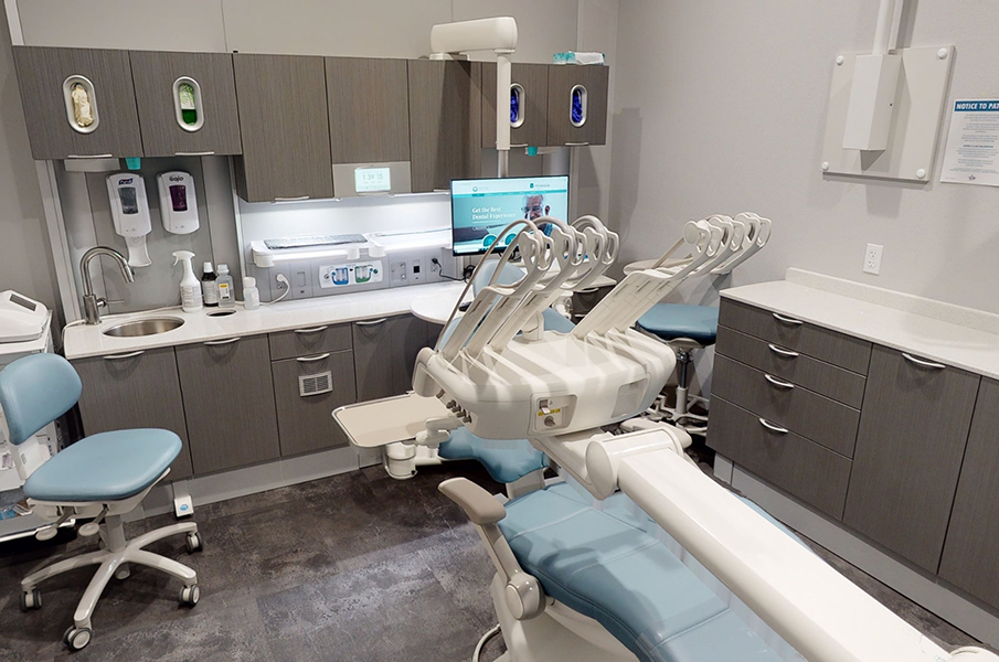 Handwashing station behind dental chair