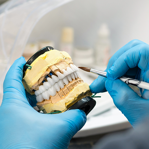 Reno prosthodontist designing a denture